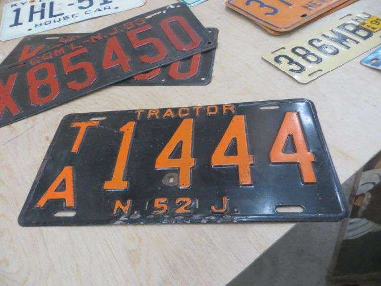 Assorted License Plates and Frames Lambrecht Auction, Inc.