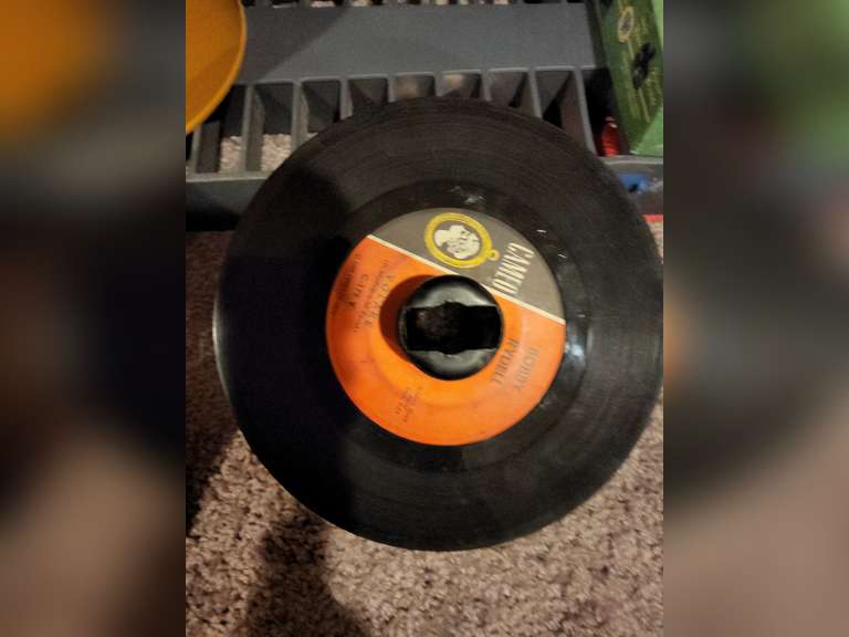 Stack of 45s vinyl records w/ carry case Lindsay Auctions & Realty LLC