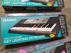 Casio LK-175 key lighted keyboard with stand - Lindsay Auctions &amp; Realty LLC
