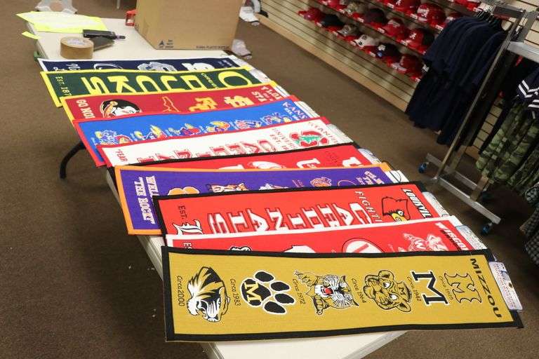 ASSORTED COLLEGE BANNERS Lawler Auction Company