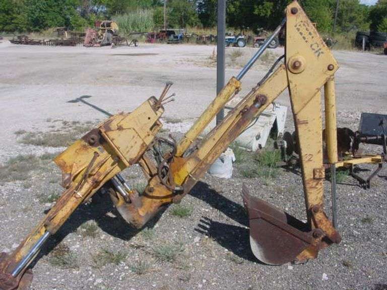 Backhoe Attachment off a case 580 Leap Auctions, LLC