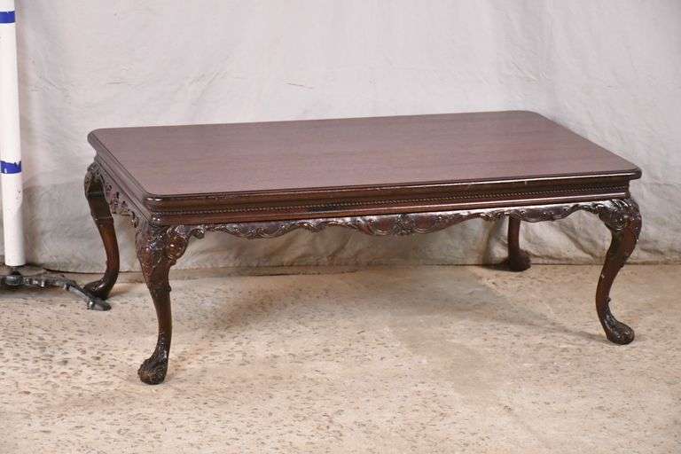 Carved mahogany French style coffee table; 919101 R.H. Lee & Co