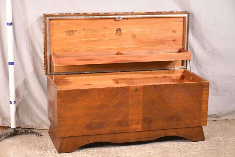Lane walnut lifttop cedar chest with floral padded seat cushion; 68
