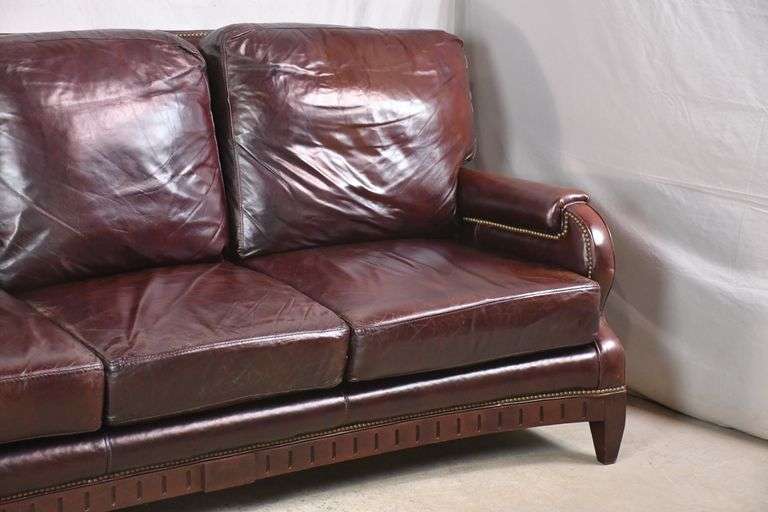 Bradington Young leather sofa with brass nail head trim; 336-1869 - R.H