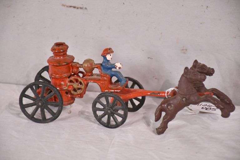 Cast iron horse drawn fire wagon toy; 1126085 R.H. Lee & Co. Auctioneers
