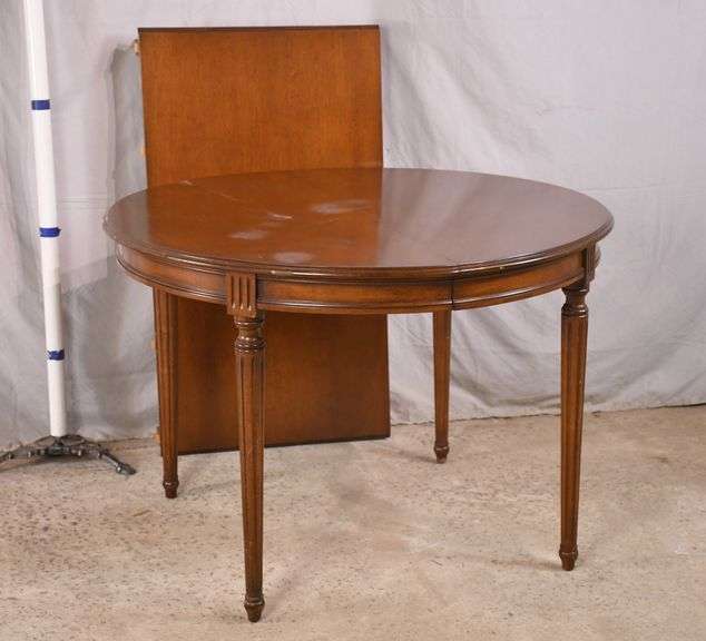 Round French style dining table with skirted leaf; 68905B R.H. Lee