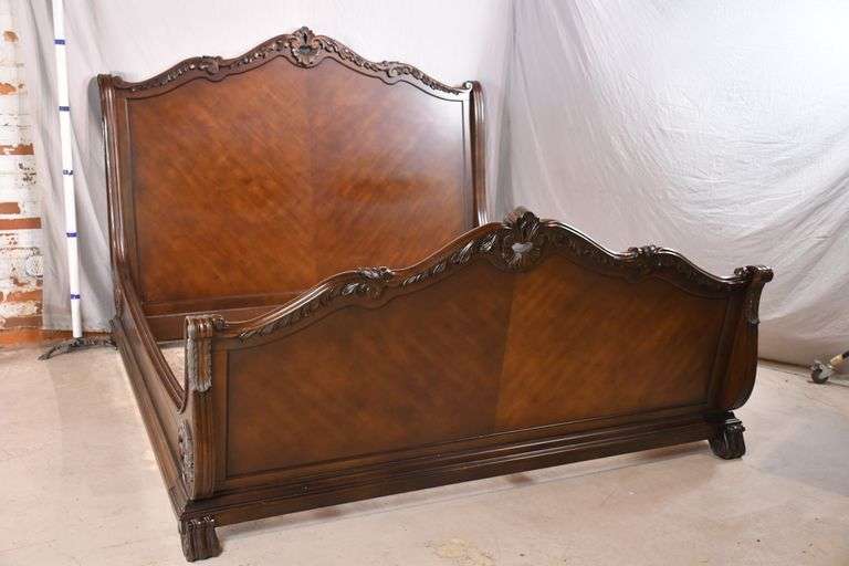 Carved king size sleigh bed with matching rails; 12750016 R.H. Lee