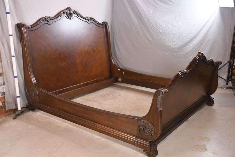 Carved king size sleigh bed with matching rails; 12750016 R.H. Lee