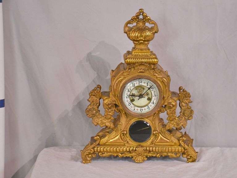 Ornate gold metal table clock; 1132102 R.H. Lee & Co. Auctioneers
