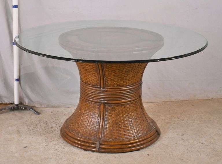 Round glass top breakfast table with inlaid woven rattan pedestal base