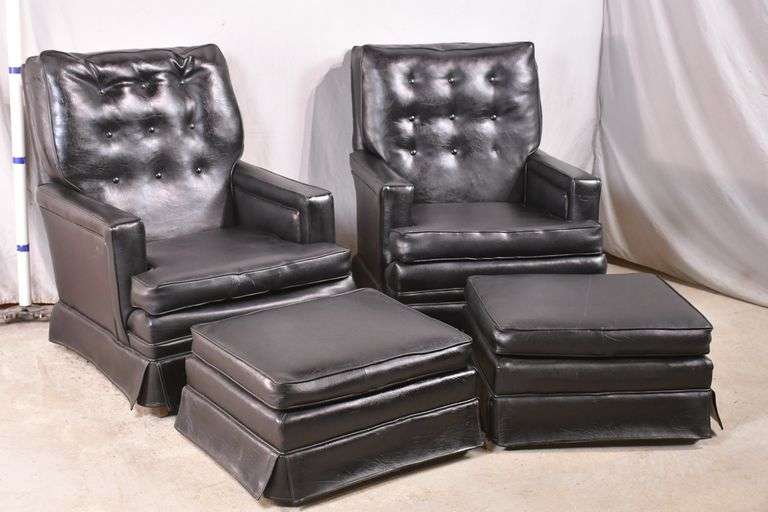 Pair of black vinyl armchairs with ottomans; 7373308 R.H. Lee & Co