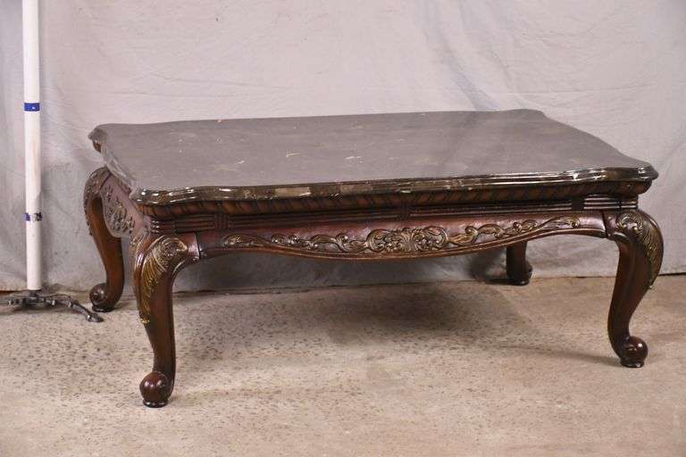 Large carved French style coffee table with marble tile top; 14675003