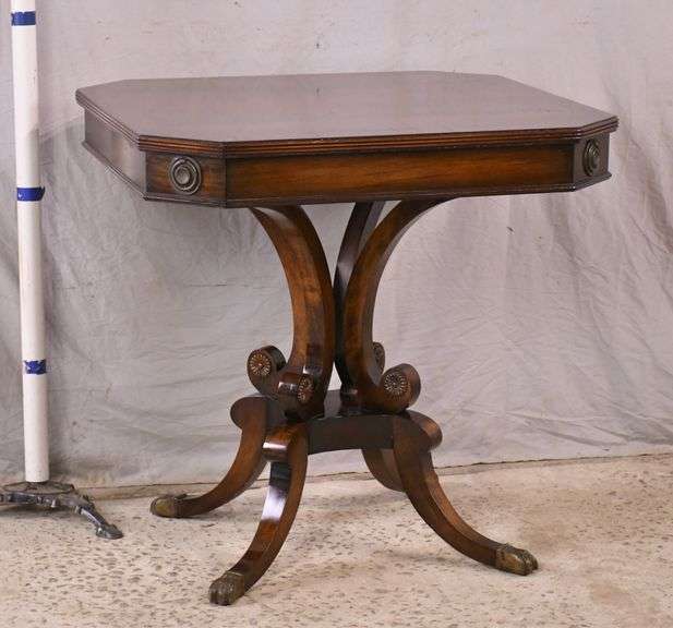 Crotch mahogany pedestal base lamp table with banded top; 854139 R.H