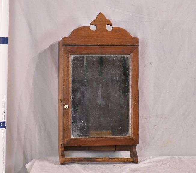 Small wooden medicine with towel bar and mirrored door; 13024