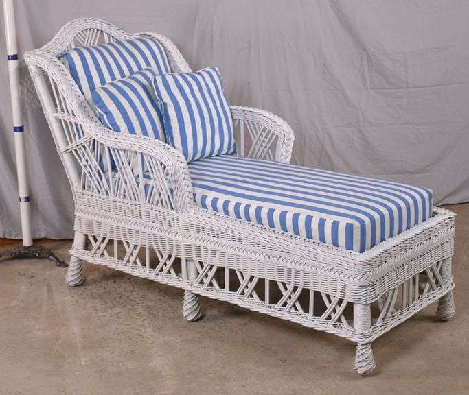 White wicker chaise lounge with blue & white striped cushion; 5958008