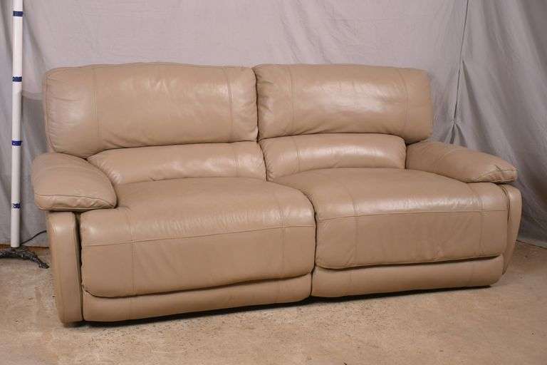 Cindy Crawford Home taupe colored leather electric reclining sofa; 1116