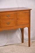 Suter's walnut huntboard with tapered legs; 200-228