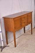 Suter's walnut huntboard with tapered legs; 200-228
