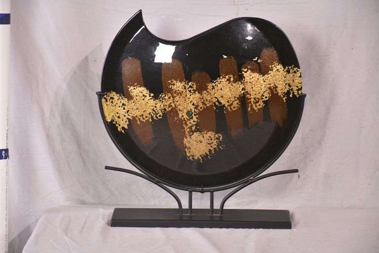Large black and gold decorative vase with iron stand; 3174062 R.H