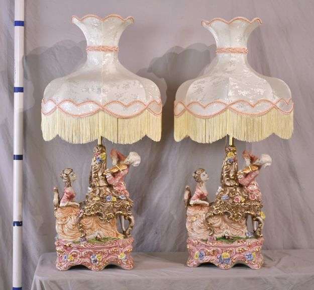 Pair of large ornate Capodimonte style porcelain figurine lamps with