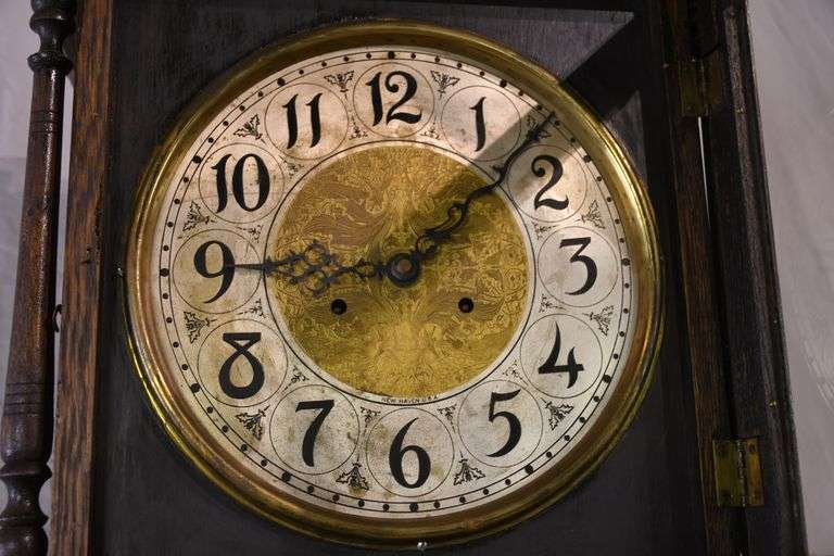 New Haven grandfather clock with oak case; 1134035 R.H. Lee & Co