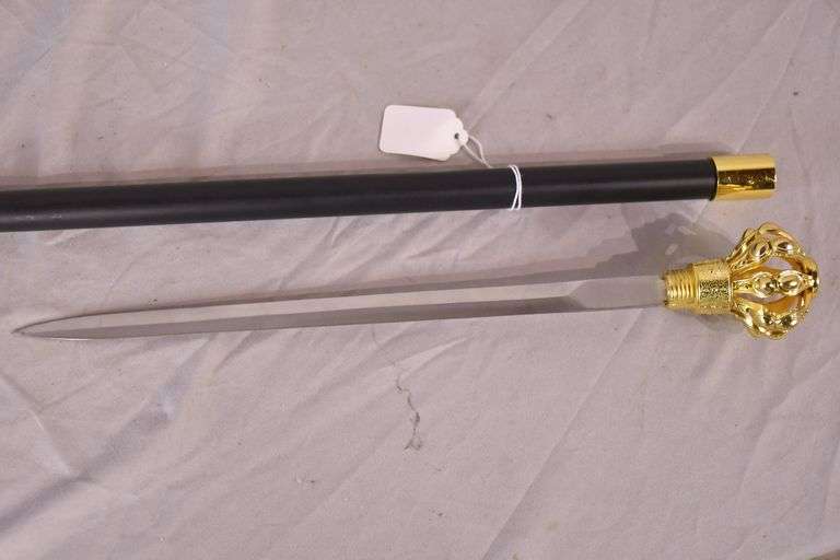 Black and gold metal cane with crown shaped handle and hidden dagger; 9485014 R.H. Lee & Co