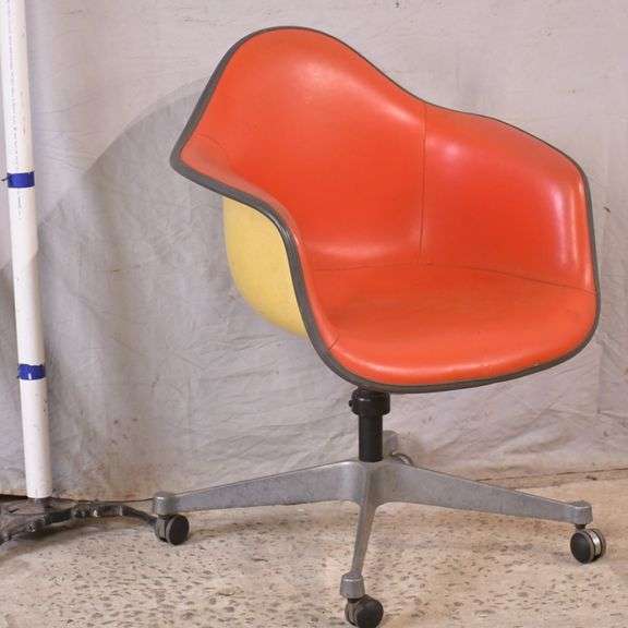 Herman Miller midcentury plastic tub chair with red vinyl interior