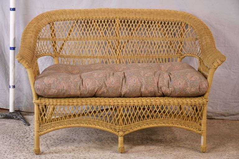 Outdoor wicker loveseat; 683173A R.H. Lee & Co. Auctioneers