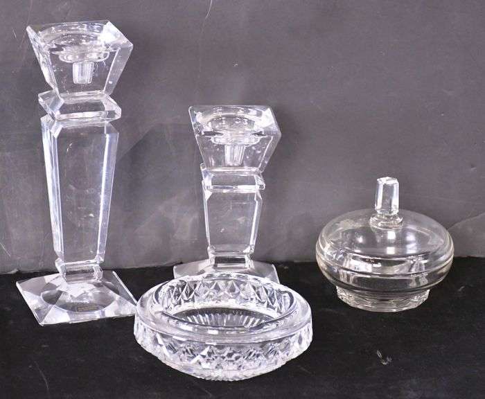 Waterford ashtray, 2 large crystal candle stands, and a covered candy