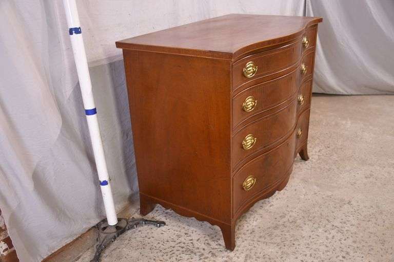 Biggs inlaid mahogany serpentine front 4 drawer bachelor's chest; 336