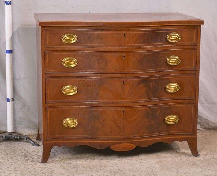Biggs inlaid mahogany serpentine front 4 drawer bachelor's chest; 336