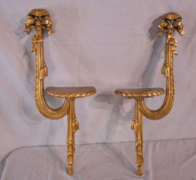Pair of ornate carved gold wall shelves; 997111 R.H. Lee & Co