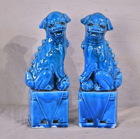 Pair of blue ceramic foo dog statues; 14221198 R.H. Lee & Co