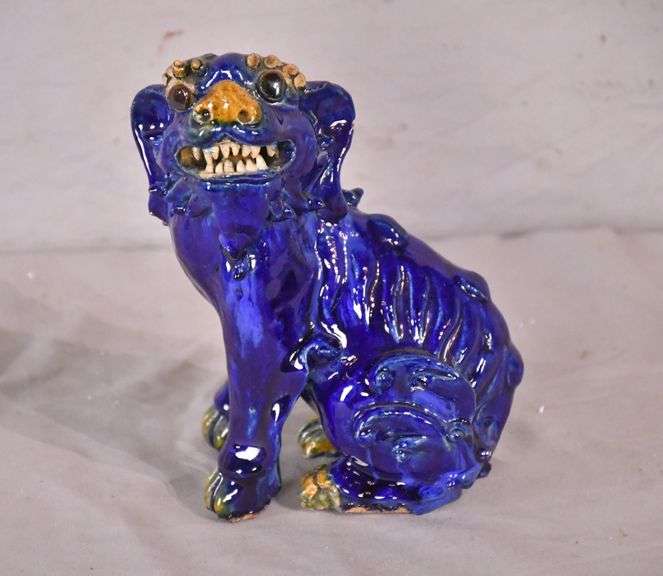 Small ceramic blue foo dog statue; 905139 R.H. Lee & Co. Auctioneers