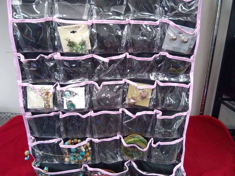 Hanging 2-sided Closet jewelry organizer with some costume jewelry