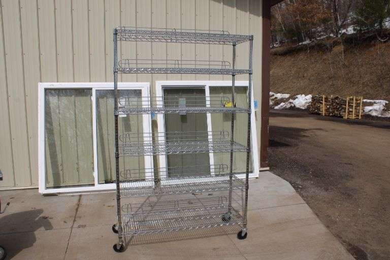 Metal wire shelving unit Lee Real Estate & Auction Service