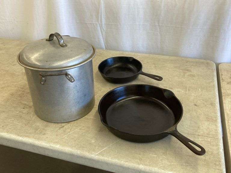 Griswald & other cast iron fry pan and camp kettle Lee Real Estate