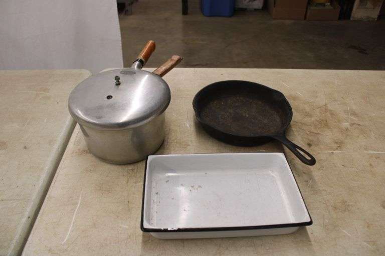Pressure cooker, cast fry pan & porcelain pan Lee Real Estate & Auction Service
