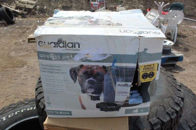 Guardian elec. wireless dog fence Lee Real Estate & Auction Service