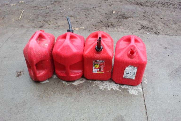 (4) 5 gal. plastic gas cans Lee Real Estate & Auction Service