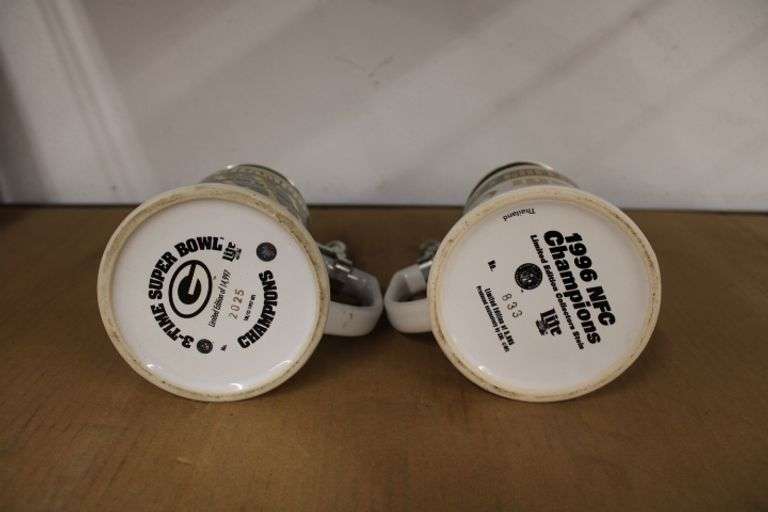 (2) Green Bay Packer Steins Lee Real Estate & Auction Service