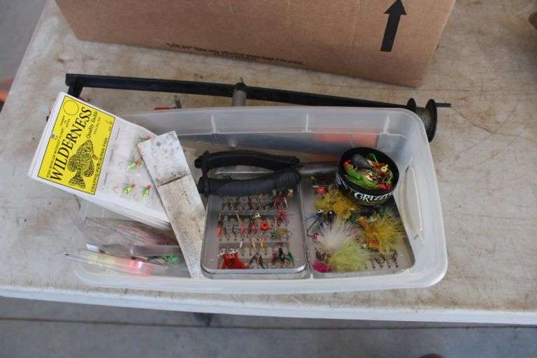 7 ice fishing poles w/reels & jigs Lee Real Estate & Auction Service