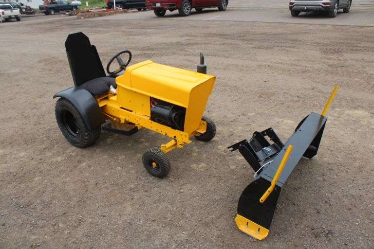 Modified 106 Cub Cadet w/ 42" Plow Lee Real Estate & Auction Service