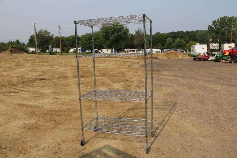 Wire shelving unit on casters Lee Real Estate & Auction Service