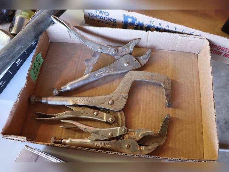 Vise grips Adam Marshall Land & Auction, LLC