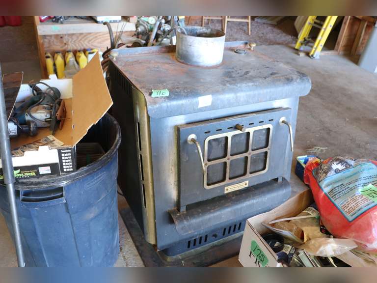 Wood burning stove and pipe Adam Marshall Land & Auction, LLC