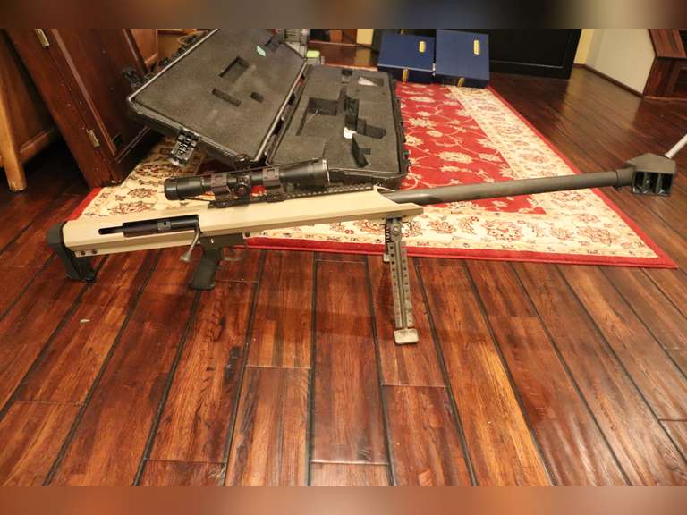 Barrett model 99 50 caliber rifle, bolt action, factory scope, bipod