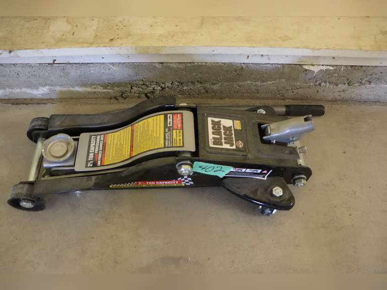 2.5 ton floor jack Adam Marshall Land & Auction, LLC