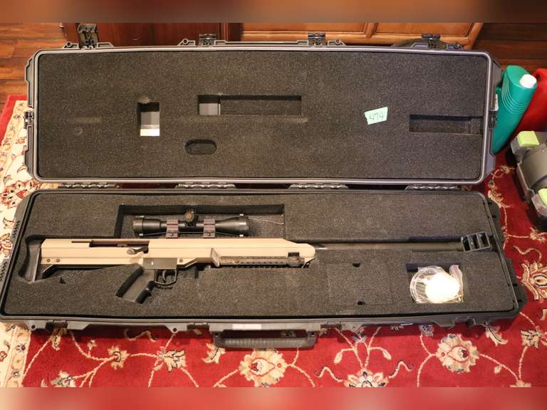 Barrett model 99 50 caliber rifle, bolt action, factory scope, bipod