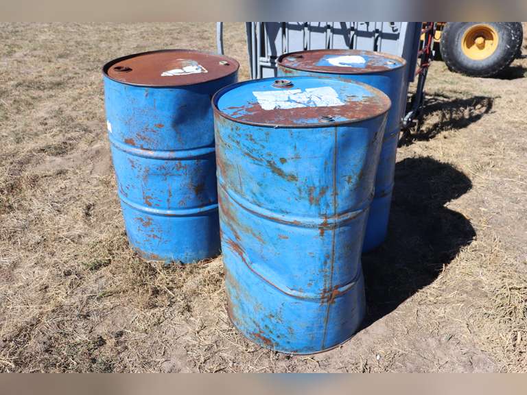3 50gal empty barrels Adam Marshall Land & Auction, LLC